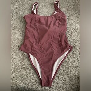 Blush swimsuit with bow tie